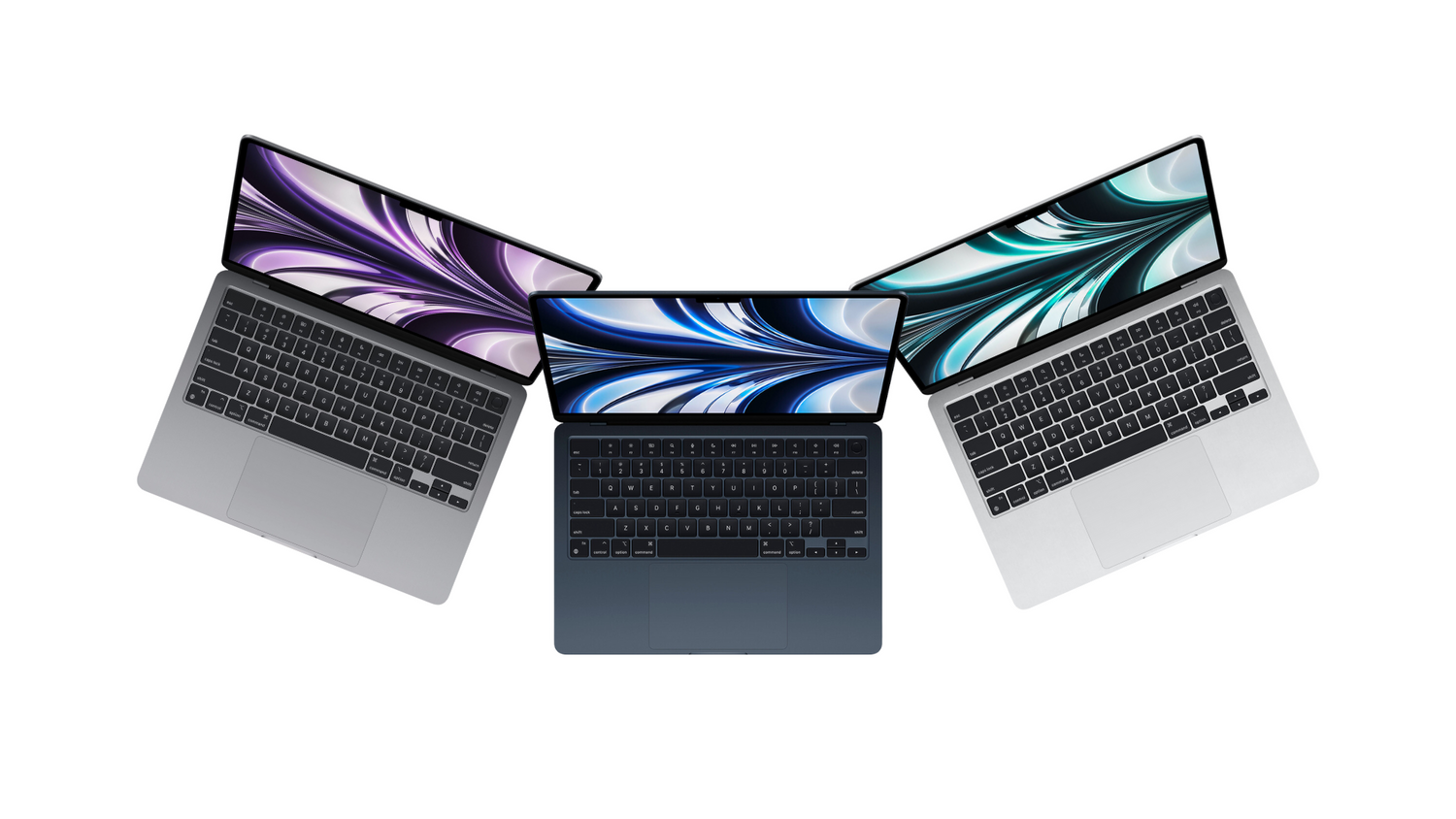 Three MacBook Pro's in a line